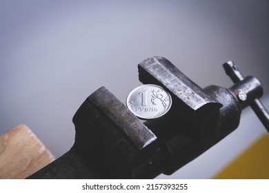 Coin in a vice. The collapse of the ruble. Falling exchange rates. The pressure of sanctions. Blocking payment in rubles.
