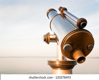 coin-operated binoculars at a lake - Powered by Shutterstock