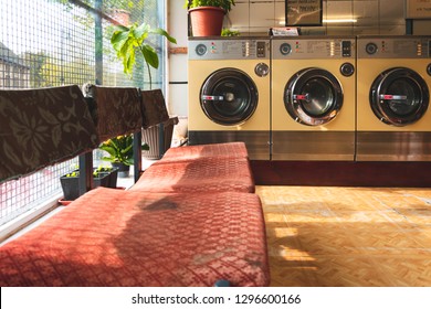 Coin-operated washing machines at a vintage laundromat