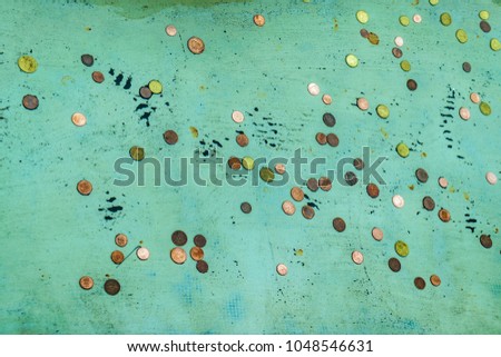 Coins at bottom of fontana di trevi, a famous tradition of tourist in Rome, Italy