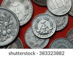 Coins of East Germany. Coat of arms of the German Democratic Republic depicted in the East German one pfennig coin (1968).