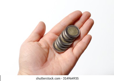 Coins Falling Down From A Hand