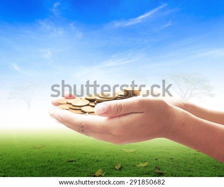 Coins in hands.