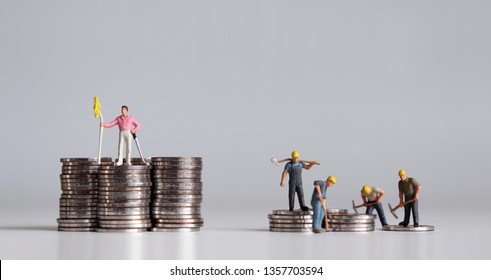 Coins And Miniature People. A Concept Of Income Inequality.