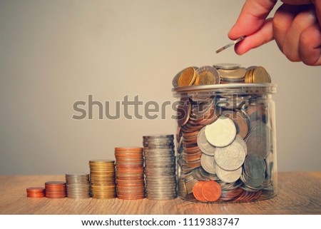 Coins money growth stacking for saving and copy space concept.Saving is first step of investor for invest in stock market.