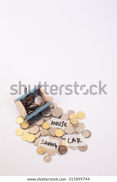 A coins money from small
box with white background and write wording 