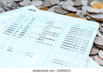 Coins On Bank Account Book