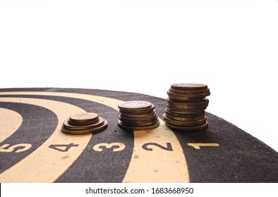 Coins On Dartboard With Copy Space. Three Stacks Of Coins On Black And White Circles. Financial Education, Competition, Budget Priorities, Targets,  Striving For A Goal, And Investment Concepts.