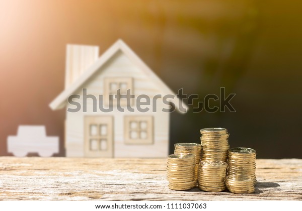 Coins On House Car Blur Background Stock Photo Edit Now 1111037063