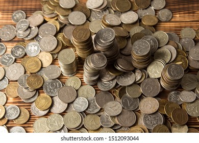 coins in rubles of different denominations on a wooden background