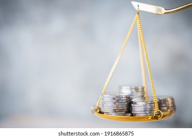 Coins Stack With Balance Scale. Money Management, Financial Plan, Time Value Of Money, Business Idea And Creative Ideas For Saving Money Concept. 