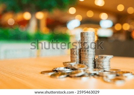 Coins stack. Concepts of the banking system, rising interest rates, inflation, deflation, and savings.