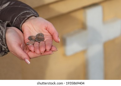 Coins In Womens Palms. Financial Hardship Concept. Background