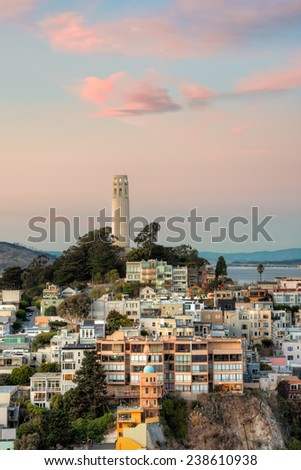 Coit Tower atop Telegraph Hill at sunset in San Francisco, California.