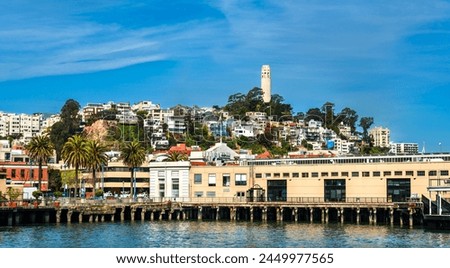 Coit Tower on Telegraph Hill as seen from Pier 7 in San Francisco - California, United States