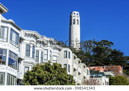 The Coit Tower photographed from a residential area of Telegraph Hill, in North Beach area of San Francisco, California, USA.