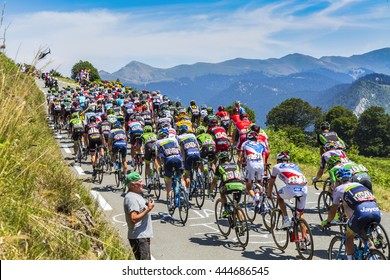 COL D'ASPIN,FRANCE - JUL 15:  The peloton  climbing the road to Col D'Aspin in Pyrenees during the stage 11 of Le Tour de France on July 15, 2015.