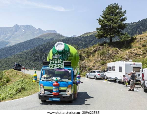 COL\
D\'ASPIN,FRANCE - JUL 15:Teisseire Caravan during the passing of the\
Publicity Caravan on the Col d\'Aspin in Pyerenees Mountains during\
the stage 11 of Le Tour de France on Juy 15,\
2015.