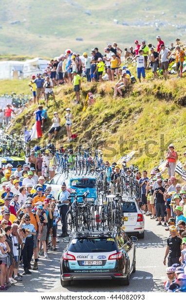 COL DU GLANDON, FRANCE - JUL 23: Row of\
technical cars driving on the road to Col du Glandon during the\
stage 18 of Le Tour de France on July 23,\
2015.