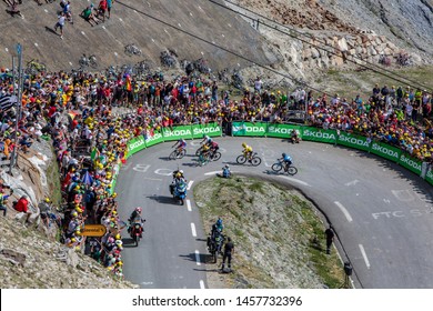 Col Du Tourmalet, France - July 20, 2019: The Group Of The Leaders Of The General Classification, Riding In A Hairpin Curve On The Road To Col Du Tourmalet During The Stage 14 Of Tour De France 2019.