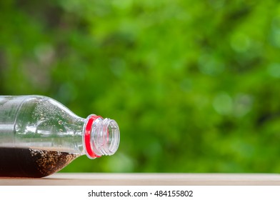 Cola in bottle.