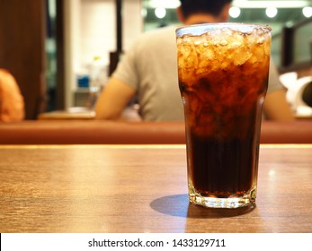 Cola Drink And Ice In The Glass. Drink That Have A Good Taste, Unhealthly Diet With Sweet Sugary Soft Drinks Concept.