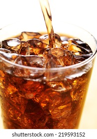 Cola In Glass Cup With Soft Drink Splash