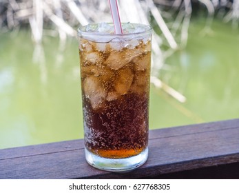 Cola And Ice In Clear Glass With Dew Point.