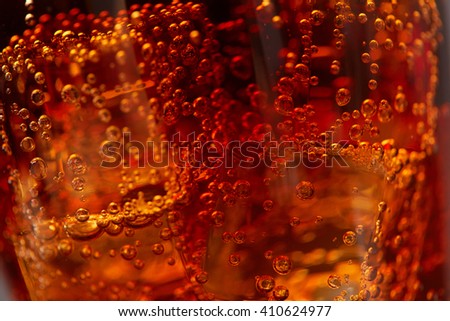 cola with ice closeup