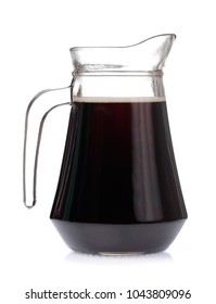 Cola In A Jug Isolated On A White Background