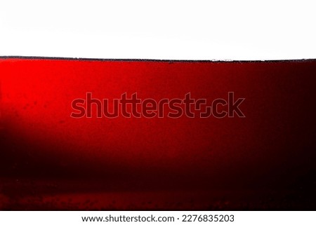 Cola texture on white background,Side view background of refreshing cola flavored soda with bubbles isolated on white