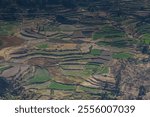 Colca canyon in Peru. Rock formations and green terraces in the Andes mountains. Peruvian tourist sights destination near Arequipa