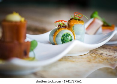 Cold Appetiser Platter: Pea Starch Noodle Rolls Filled Vegetable With Sesame Sauce And Xo Chili Sauce.