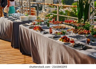 Cold Appetizers For An Event With Catering, A Table With A Variety Of Treats At An Outdoor Feast