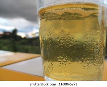 Cold Beer In A Cloudy Summer Day