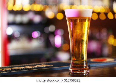 Cold Beer Glass On Bar Or Pub Desk