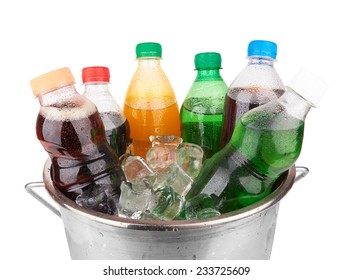 Cold Beverages In Plastic  Bottles On Heap Of Ice Cubes