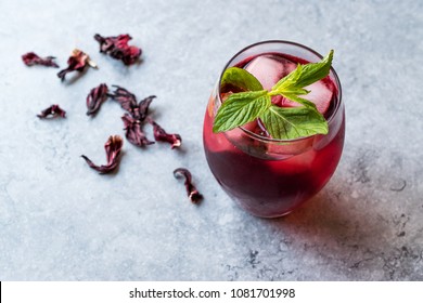 Cold Brew Hibiscus Tea With Ice And Mint Leaves.