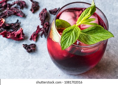 Cold Brew Hibiscus Tea With Ice And Mint Leaves.