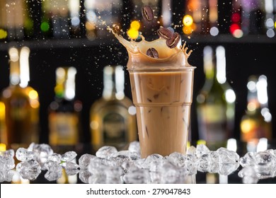 Cold Coffee Drink With Ice, Beans And Splash, Close-up.