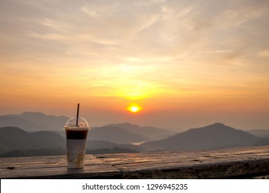 Cold coffee, sunset valley backdrop
