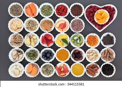 Cold Cure And Flu Remedy Food With Immune Boosting Health Foods High In Antioxidants, Anthicayans, Vitamin C With Supplement Capsules And Medicinal Herbs. Flat Lay, Top View.