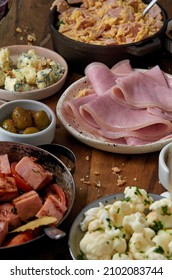 Cold Cuts Ham And Ingredients On Wooden Background