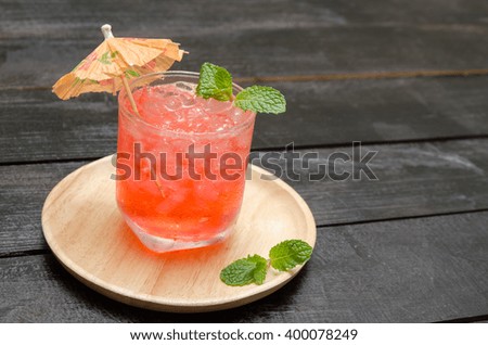 cold drink with mint and ice in a glass. style vintage. selective focus