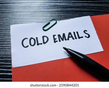 Cold emails writting on table background