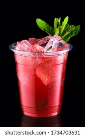 Cold Fizz Cocktail With Strawberry In Take Away Cup Isolated On Black Background