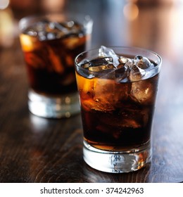 Cold Fizzy Cola Soda With Ice In Glass Cup