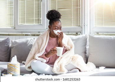 Cold And Flu. Portrait Of Ill African American Woman Caught Cold, Feeling Sick And Sneezing In Paper Wipe. Closeup Of Beautiful Unhealthy Girl Covered In Blanket Wiping Nose. Healthcare Concept. - Shutterstock ID 1681253263