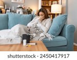Cold And Flu. Portrait Of Ill Woman Caught Cold, Feeling Sick And Sneezing In Paper Wipe. Closeup Of Beautiful Unhealthy Girl Covered In Blanket Wiping Nose. Healthcare Concept.