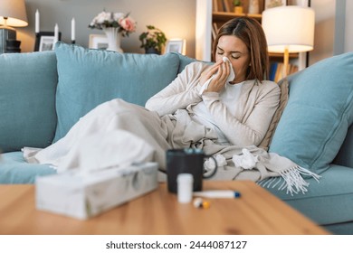 Cold And Flu. Portrait Of Ill Woman Caught Cold, Feeling Sick And Sneezing In Paper Wipe. Closeup Of Beautiful Unhealthy Girl Covered In Blanket Wiping Nose. Healthcare Concept. - Powered by Shutterstock